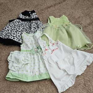 Set of Four Girls' Dresses in Green, Black, and White